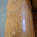 Fauteuil ancien en cuir de mouton
