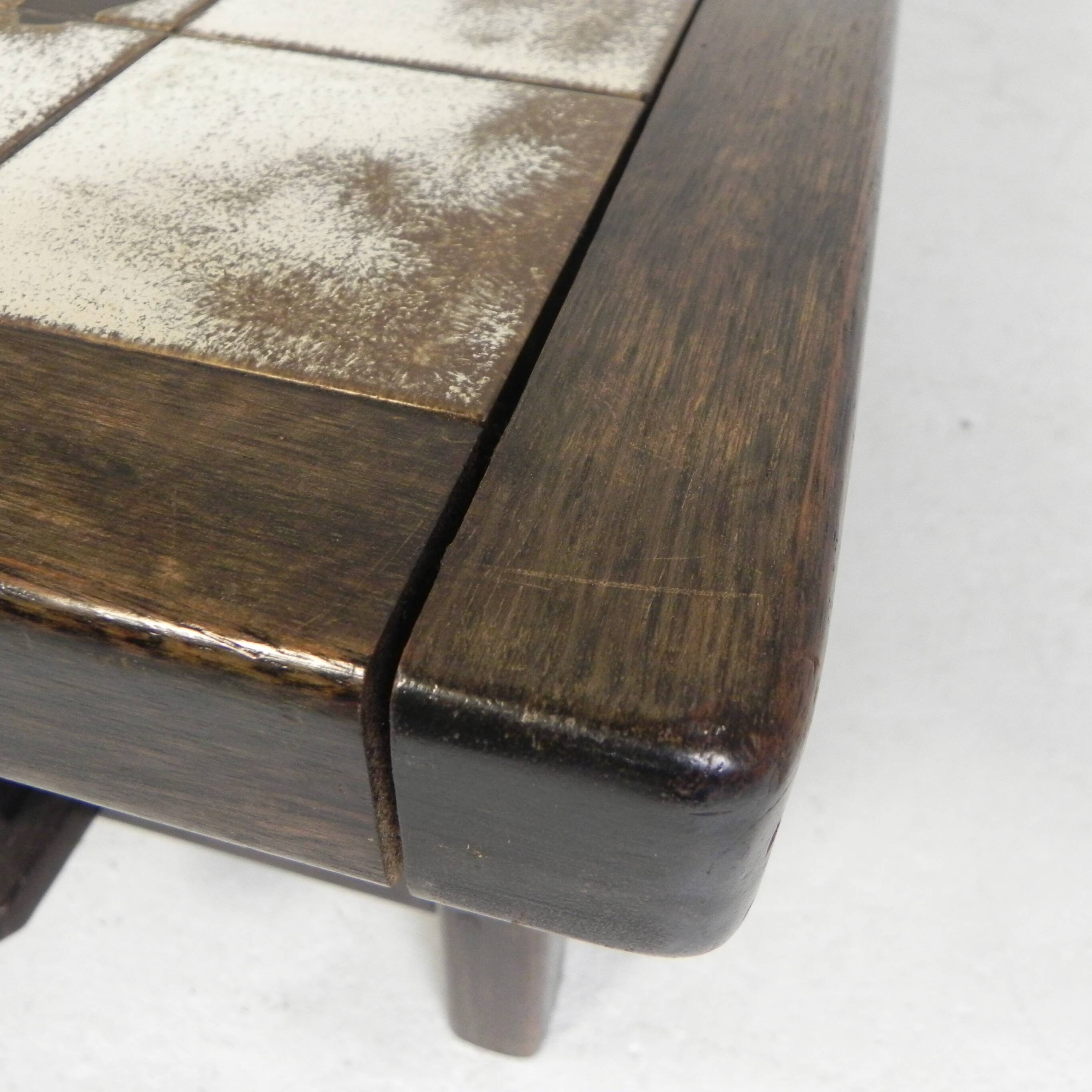Square tile table from Vallauris, signed Dan with an image of a fantastic bird, 1960s.