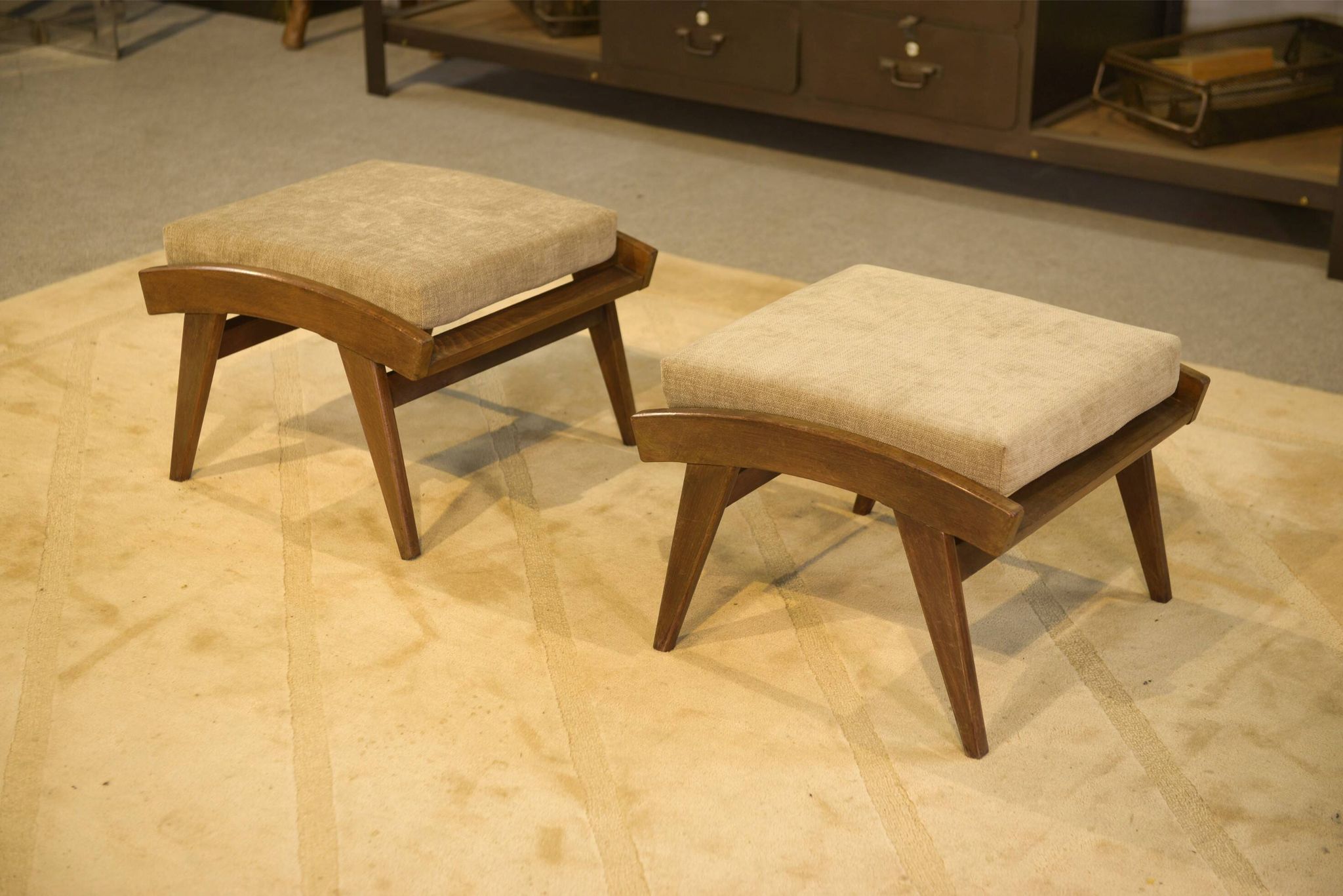 Scandinavian armchair and two 1960s ottomans.