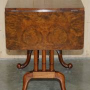 Antique extendable coffee table circa 1880 in solid walnut.