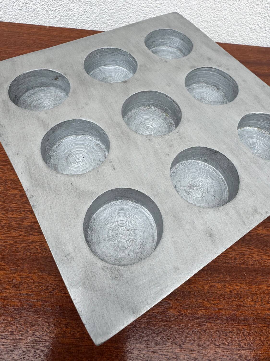 Brutalist style brushed aluminum candle holder