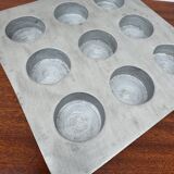 Brutalist style brushed aluminum candle holder