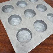 Brutalist style brushed aluminum candle holder