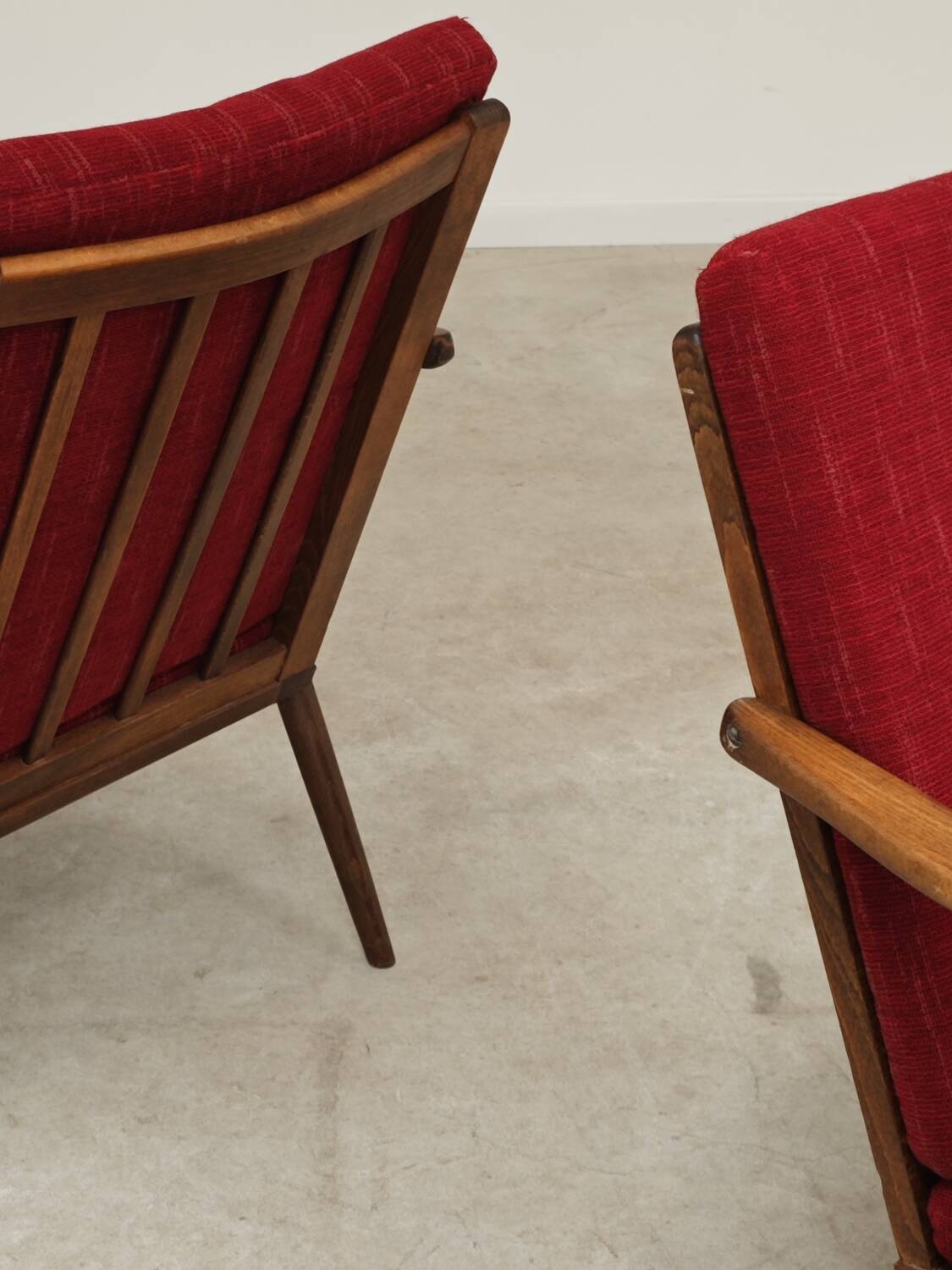 Pair of burgundy boomerang armchairs Antonin Suman Ton Bystrice (Thonet)