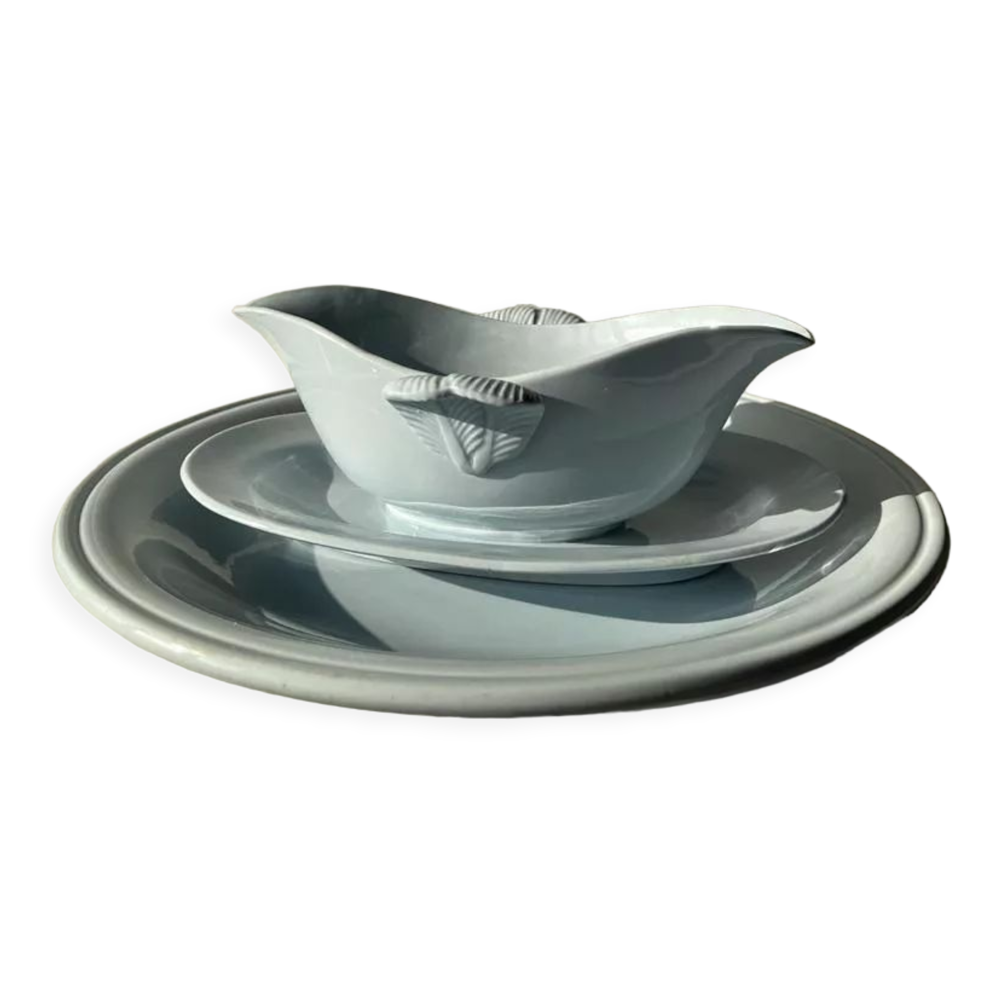 Flat set and light blue saucière earthenware from Montereau