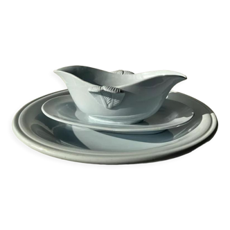 Flat set and light blue saucière earthenware from Montereau