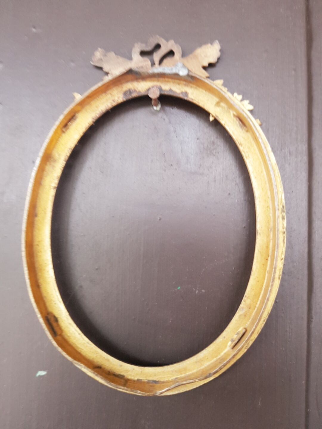 Old bronze oval format frame