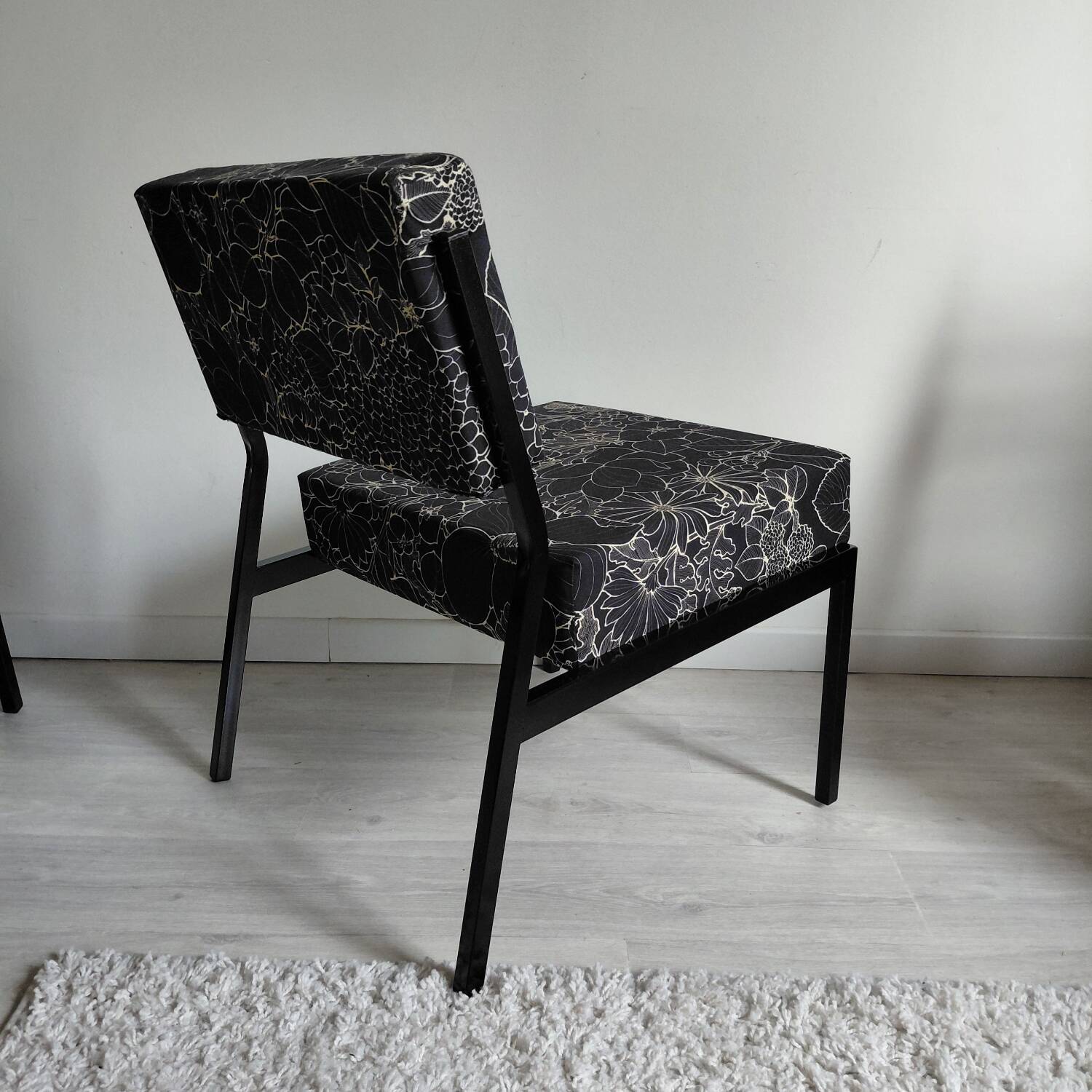 Pair of black metal and fabric armchairs, 1970s, restored.
