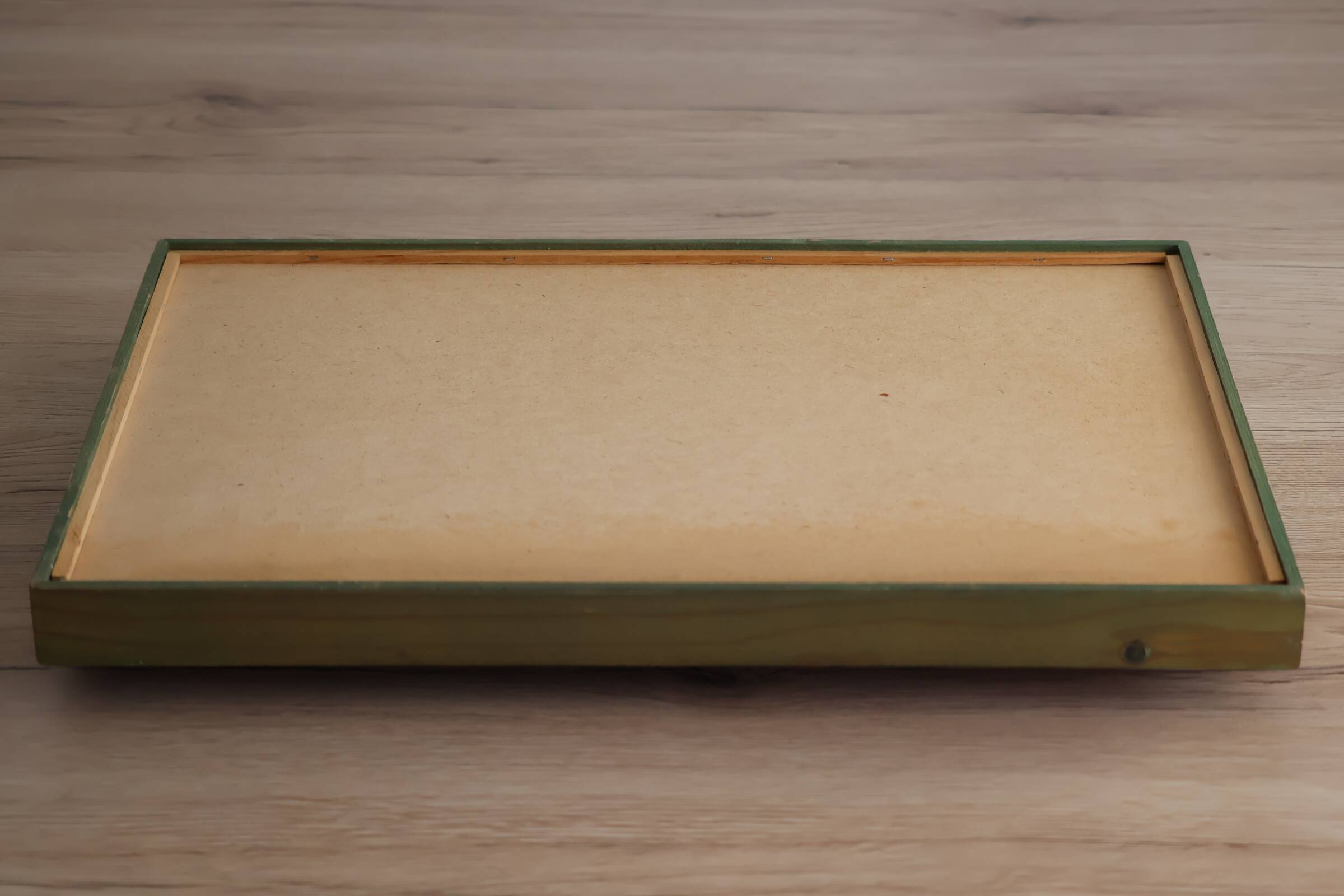 Wooden serving tray with fruit decor in green color