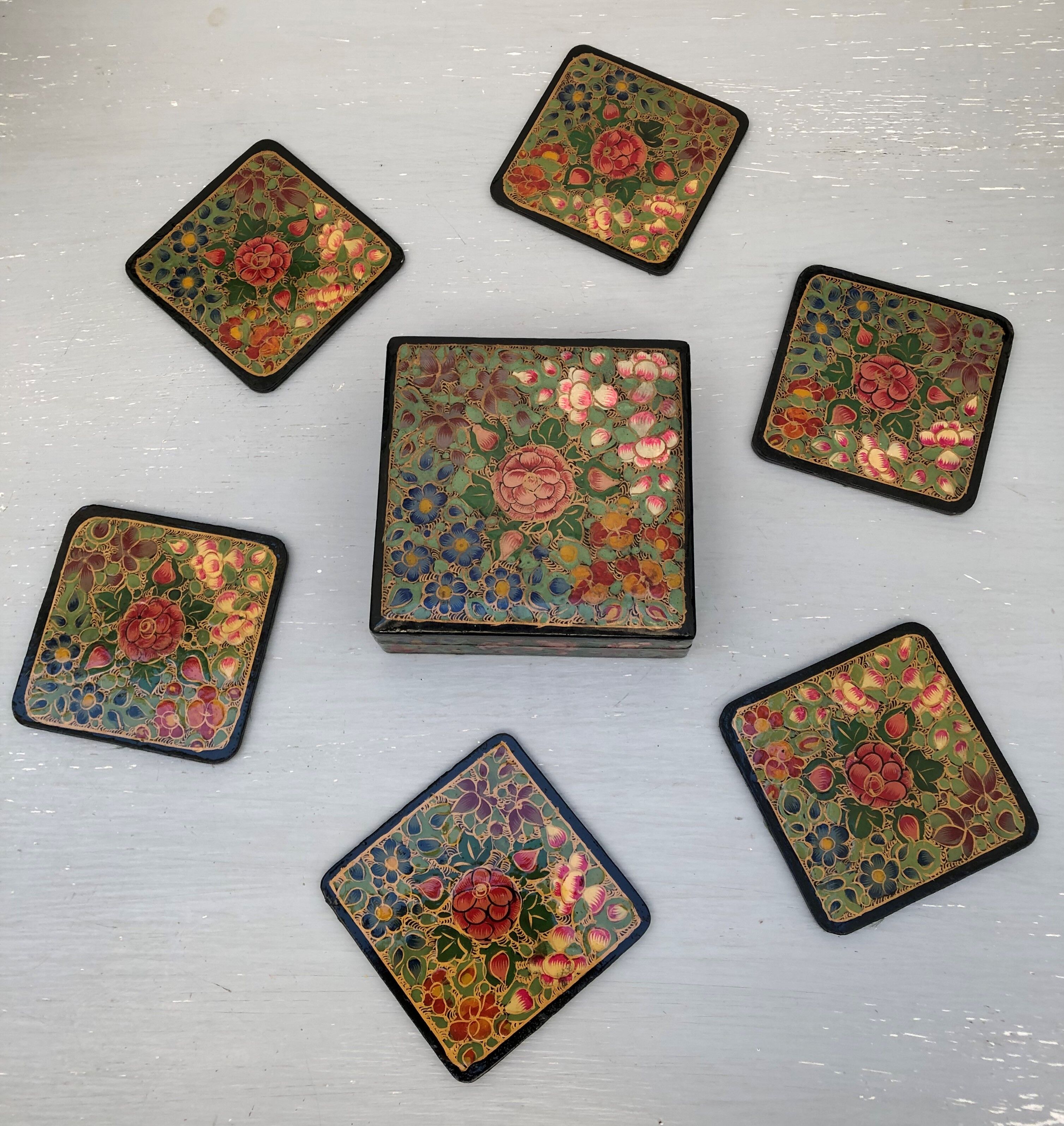6 under glass decorated with flowers