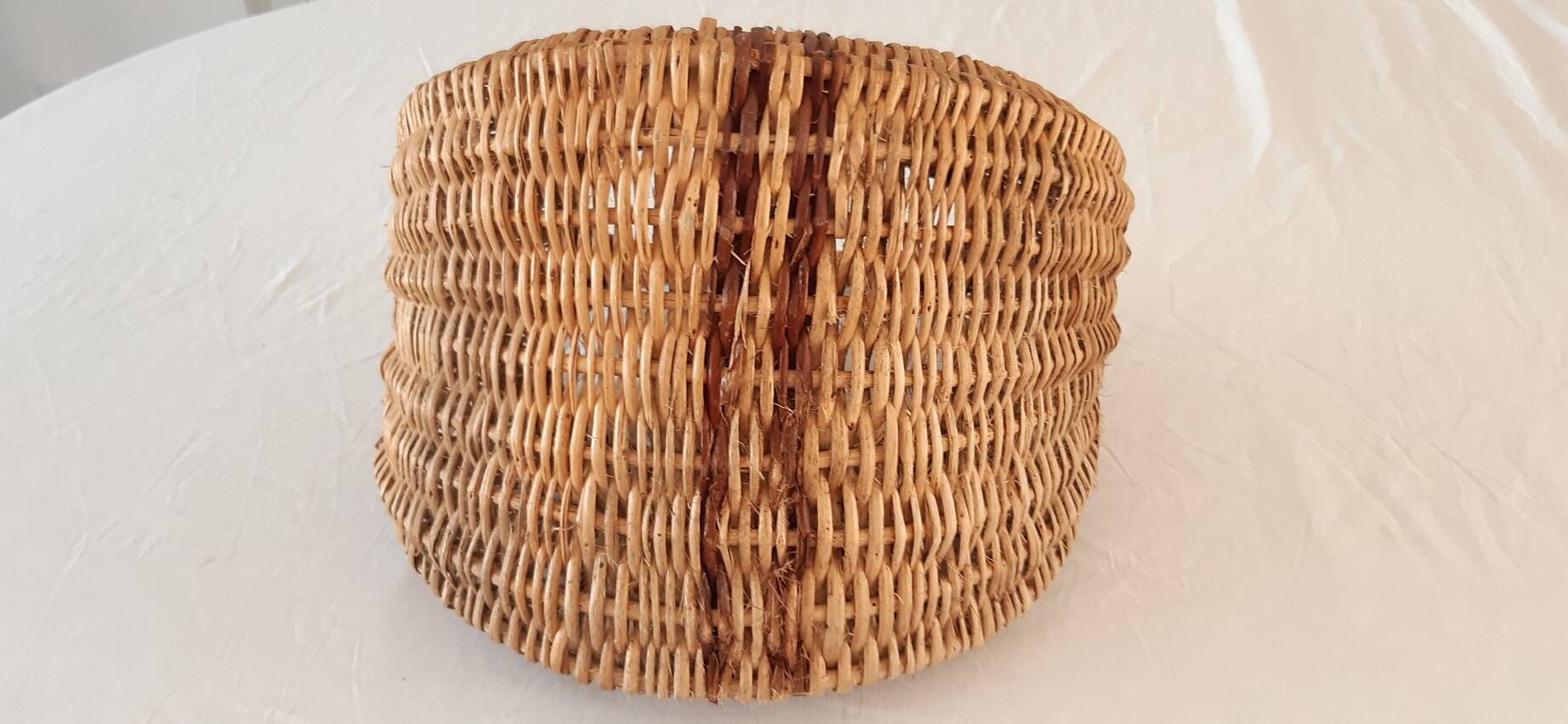 Old banana basket with wicker two colors
