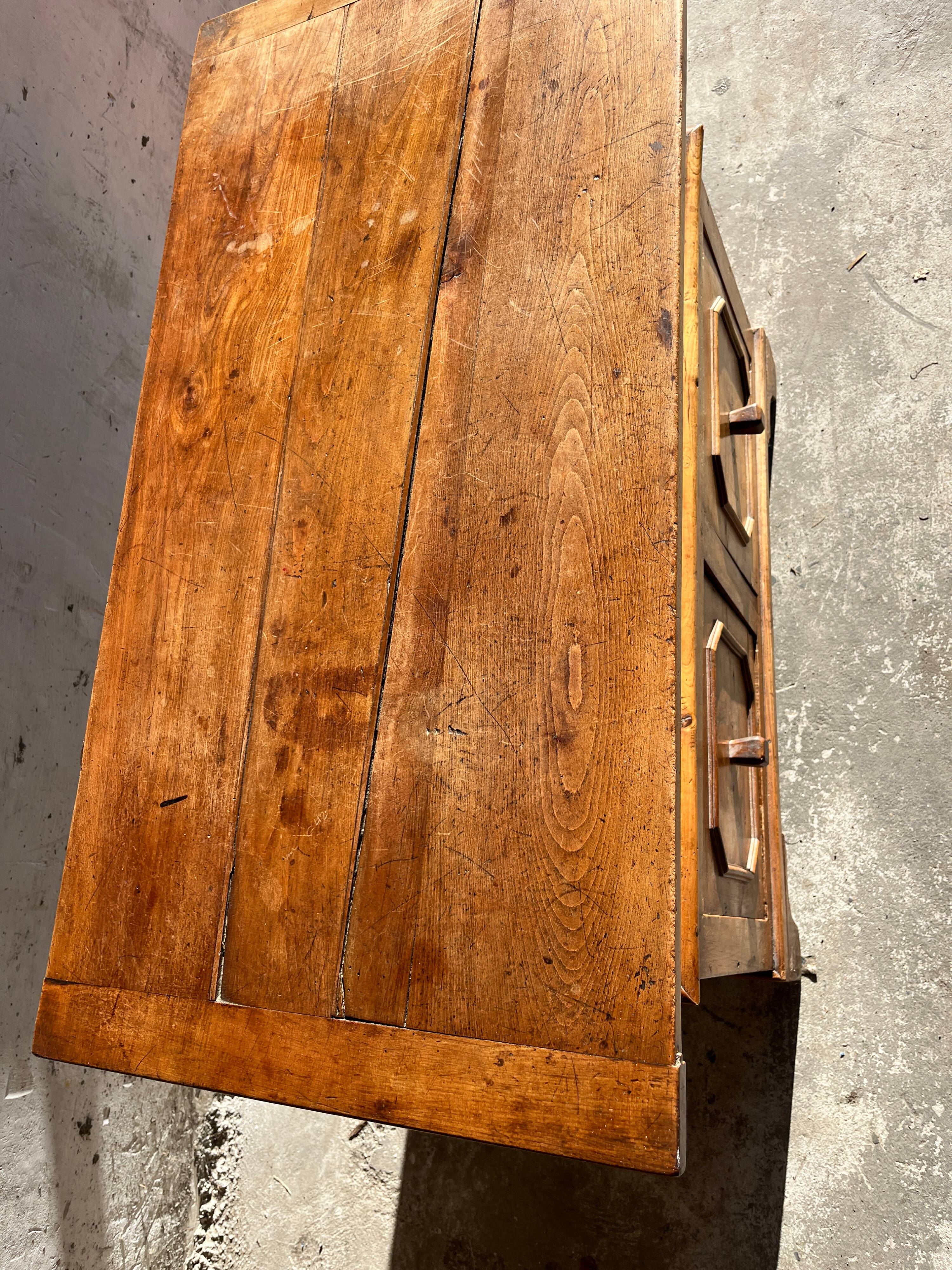 Old wooden baker's chest with storage drawers