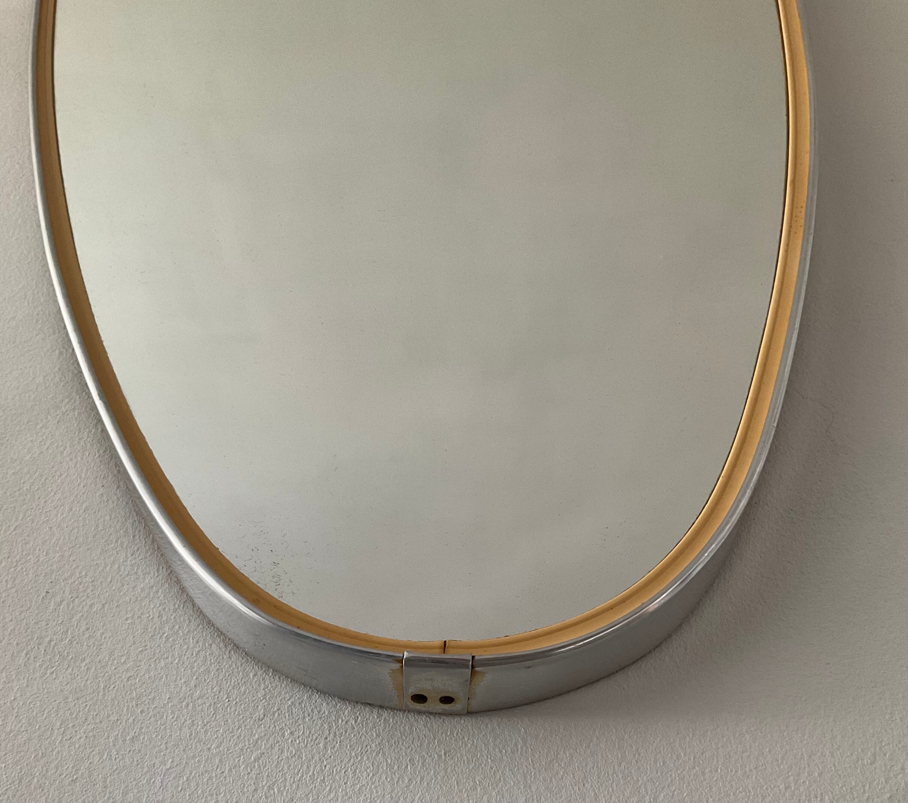 Asymmetrical mirror Deknudt from the 60s