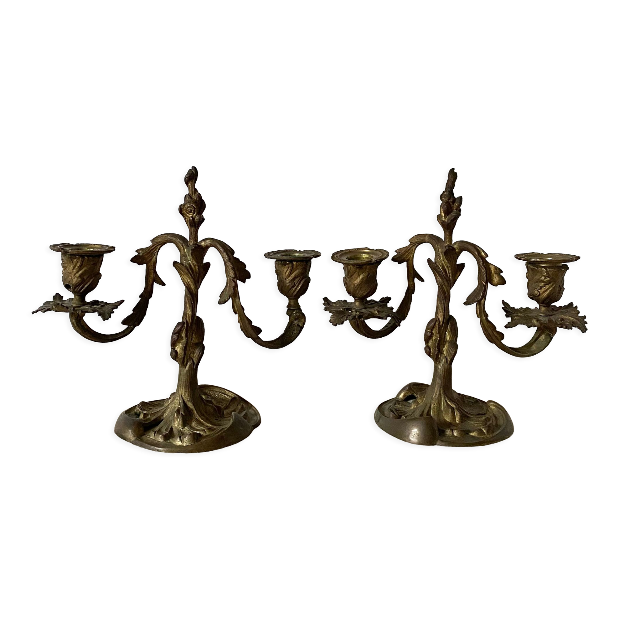 Pair of antique bronze candlesticks at the end of the table XIXth