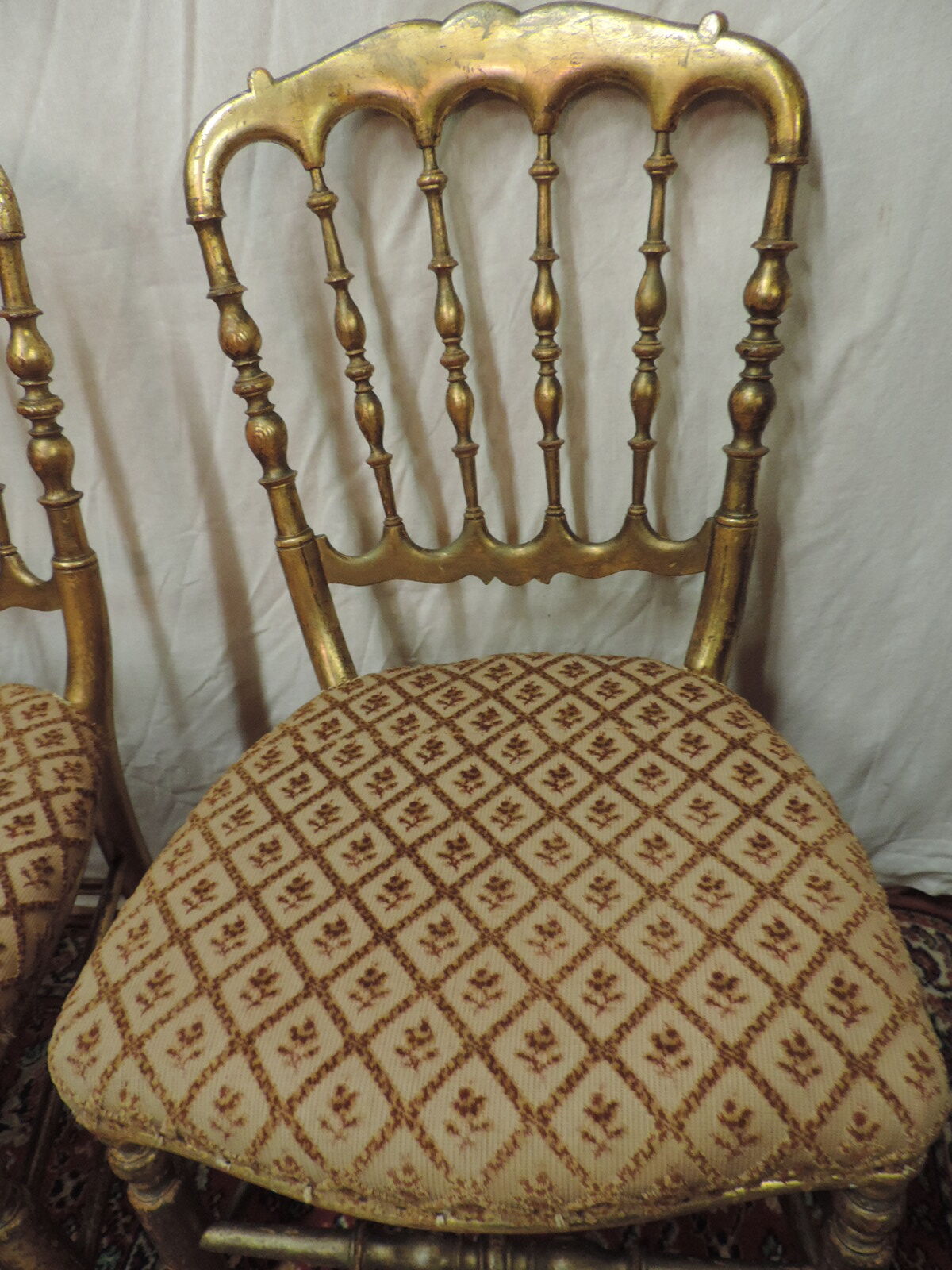 Paire de chaises en bois doré NIII