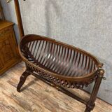 Empire Mahogany Swan Neck Cradle in the Shape of a Basket Circa 1810