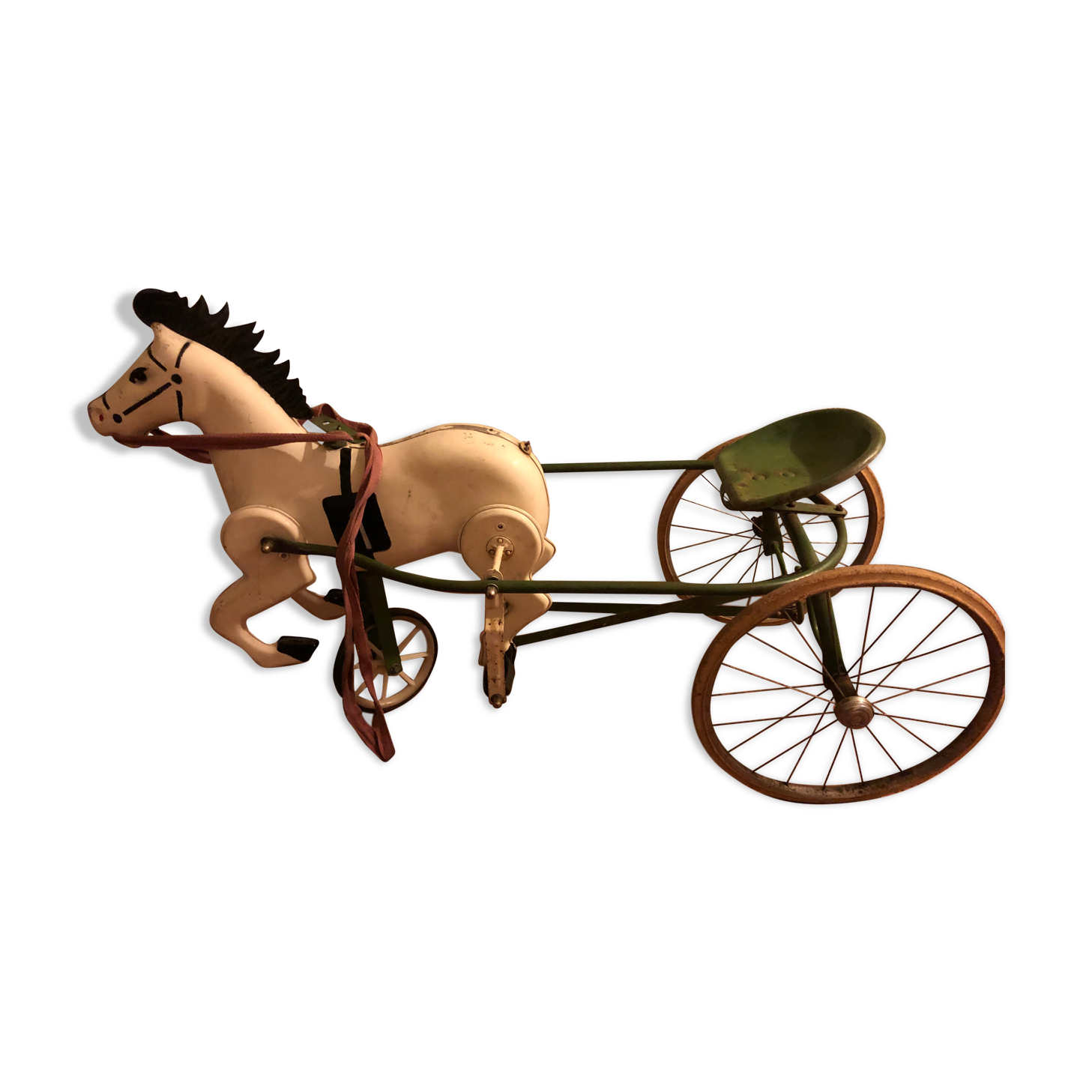 Old pedal horse with sulky