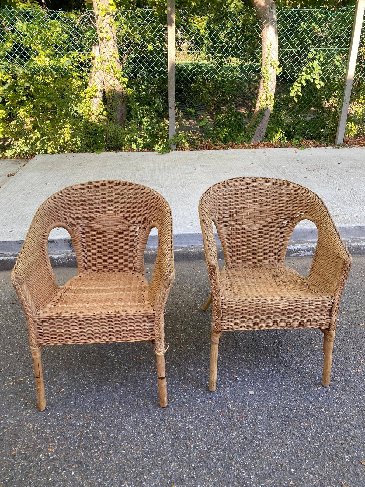 Rattan and woven wicker armchair in vintage bohemian style