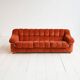 Vintage rust velvet sofa from the 1970s with metal details.