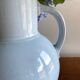 Antique vase in pale blue ceramic