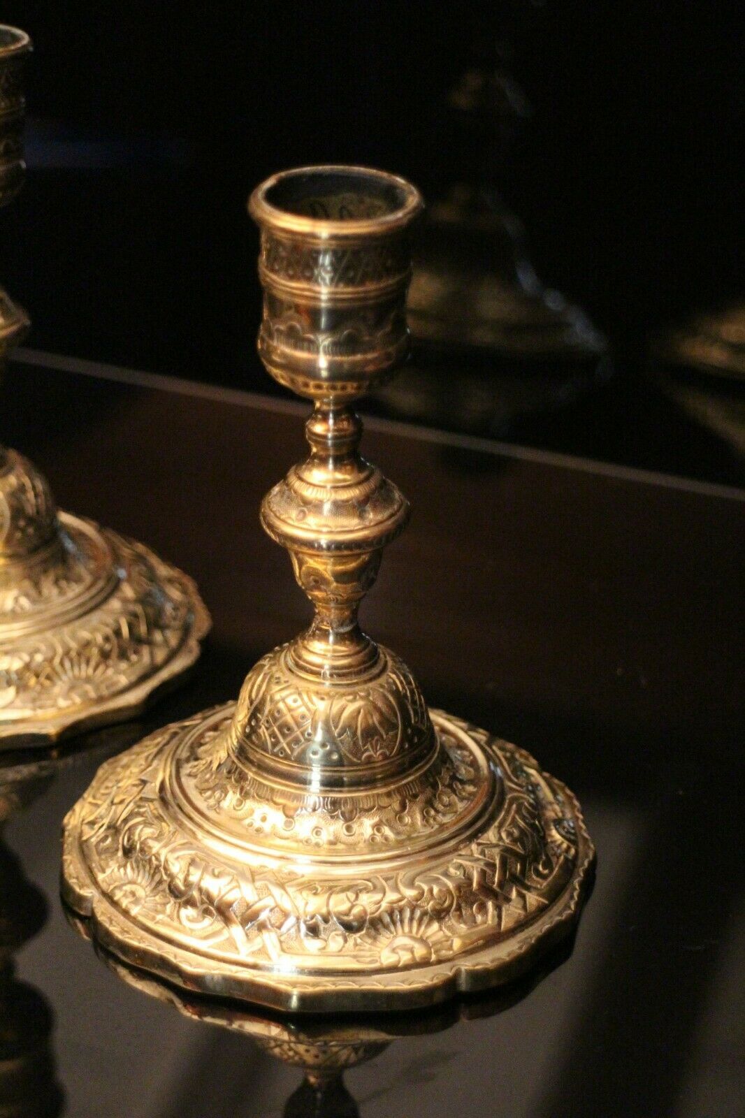 Pair of 19th bronze candlesticks with Regency-style chiseled decoration