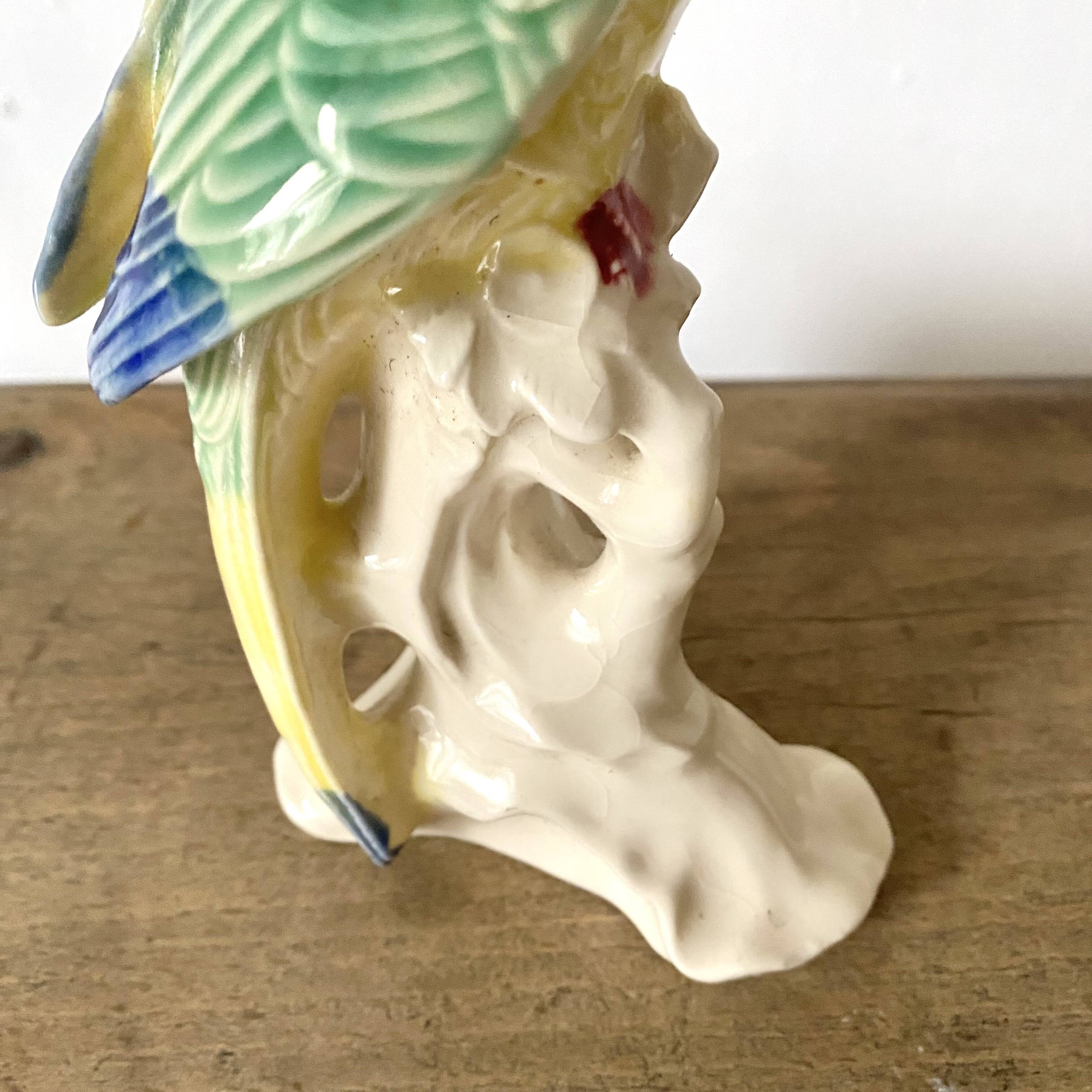 Ceramic parakeet, exotic bird in slip