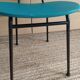 Vintage chair in turquoise green vinyl with black metal legs