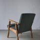 Henning Kjaernulf oak scalloped lounge chair | Denmark | 1950s