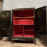 Chinese cabinet in black lacquer and colored decorations