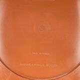 Round mirror with amber rim from the 70s, vintage