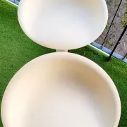 Two bombo stools by magis designed by stefano giovannoni.