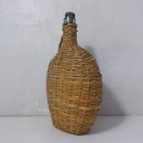 old bottle dressed in rattan vintage pilgrim gourd