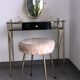 Brass hairdresser, glass and black plastic with its fluffy stool.