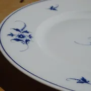 Fine Limoges porcelain dessert service: dish and 12 plates.