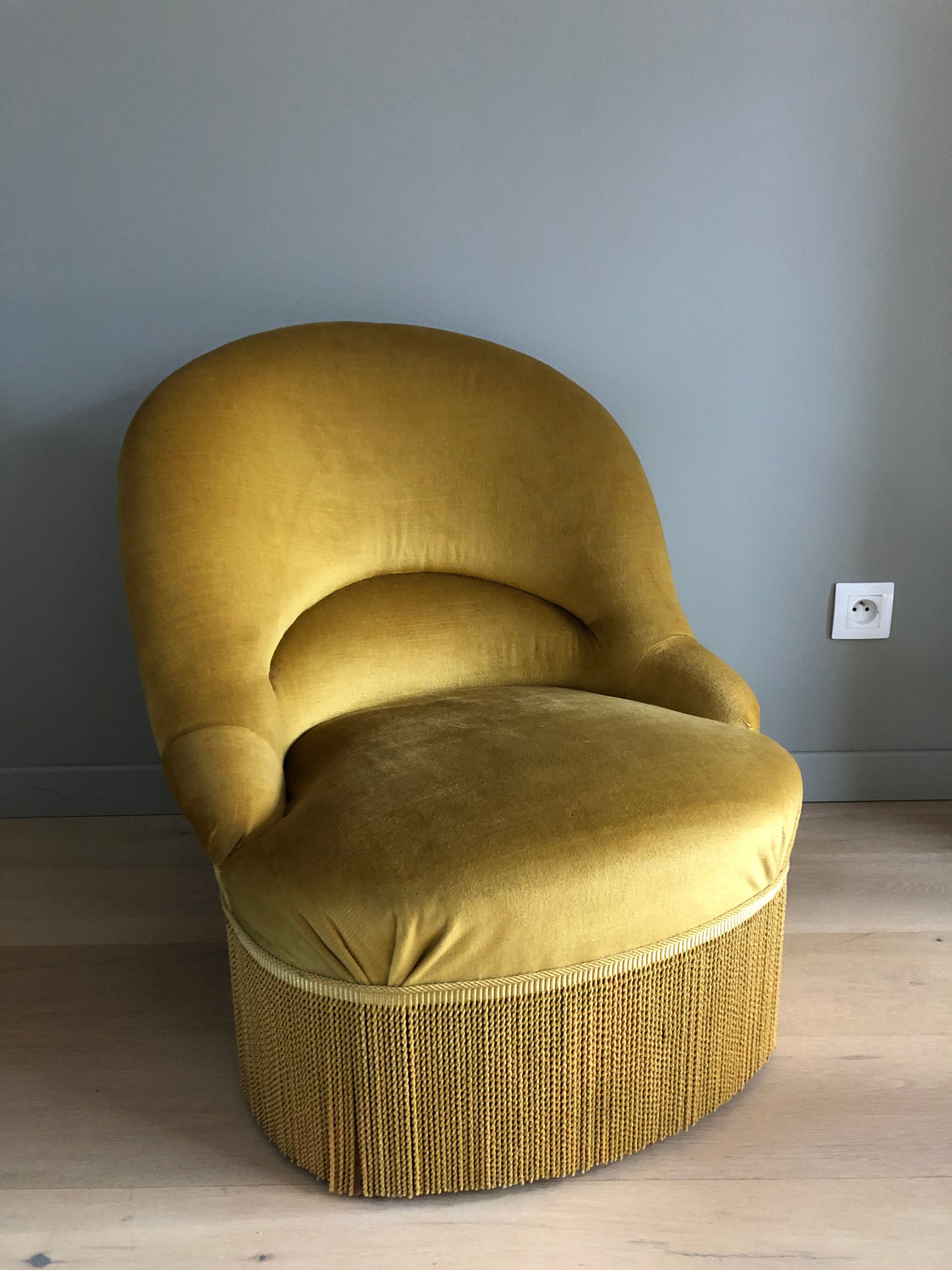 Fauteuil crapaud à franges vintage