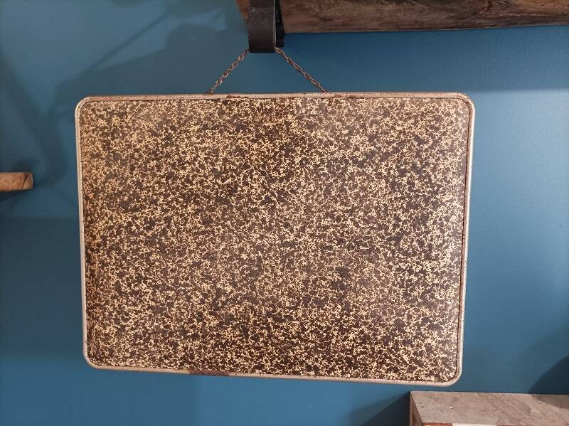 Barber mirror patinated metal surround