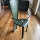 6 chaises attribuées à Costantini en cuir vert