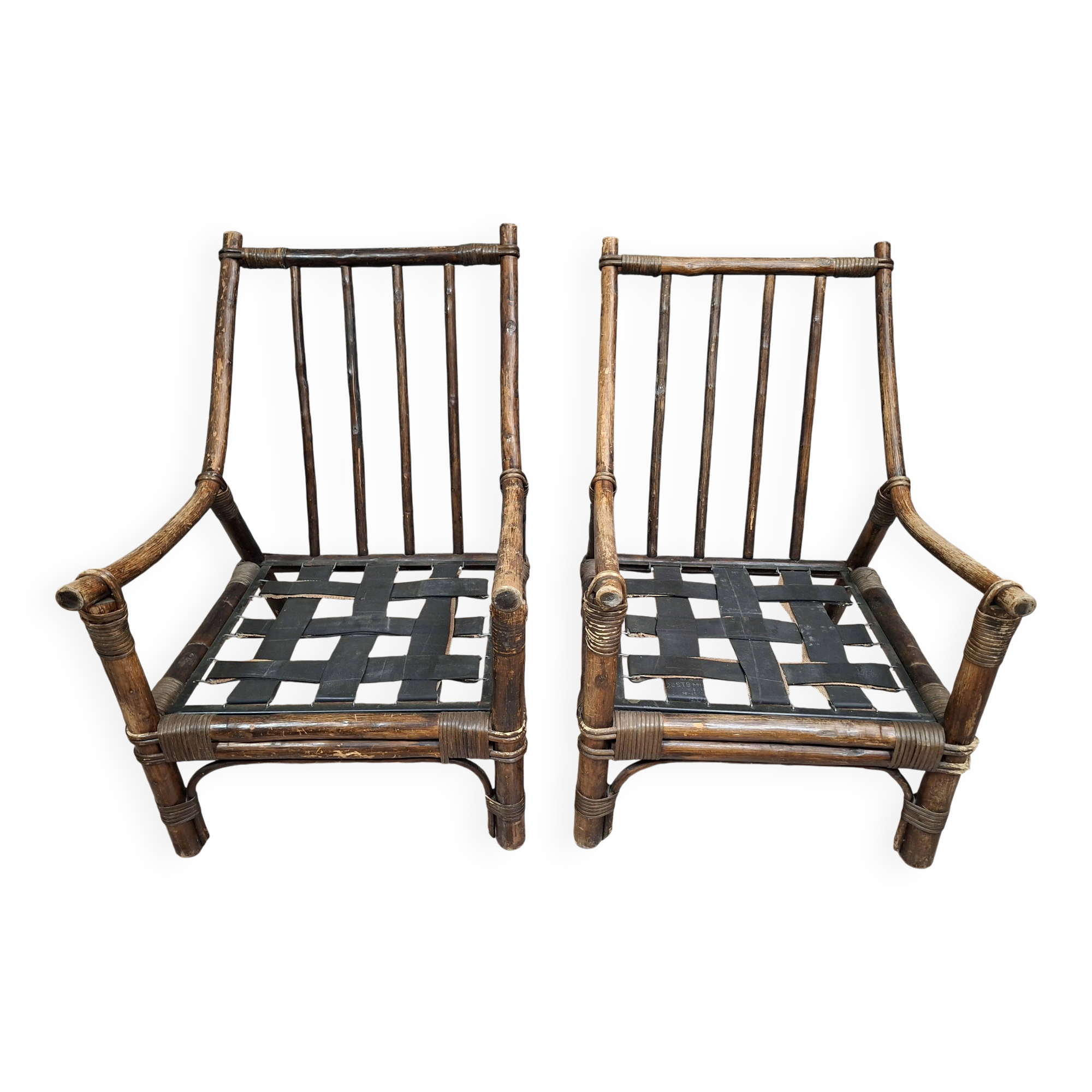 Pair of low bamboo armchairs with an exotic spirit, dating from the early 20th century.