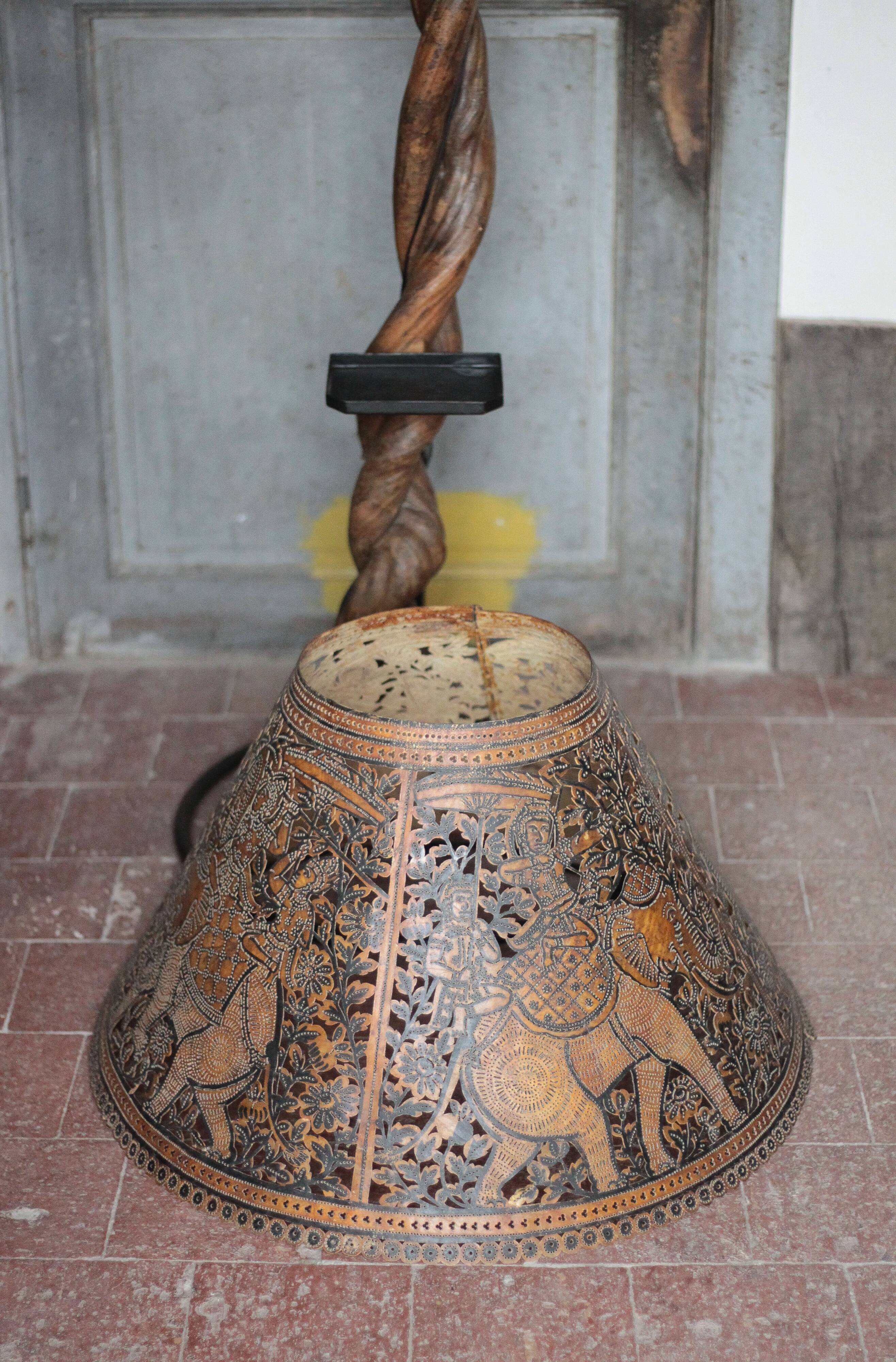 Liane and metal floor lamp with perforated leather shade featuring elephant patterns, lise.