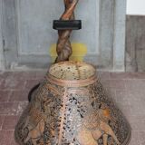 Liane and metal floor lamp with perforated leather shade featuring elephant patterns, lise.