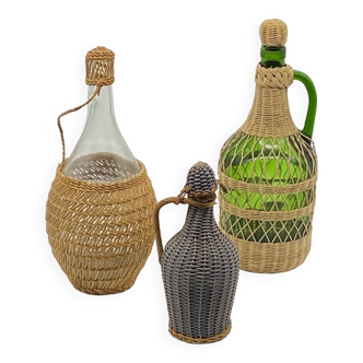 Trio bottles / lady Jeanne, dressed in wicker, rattan, natural fibers