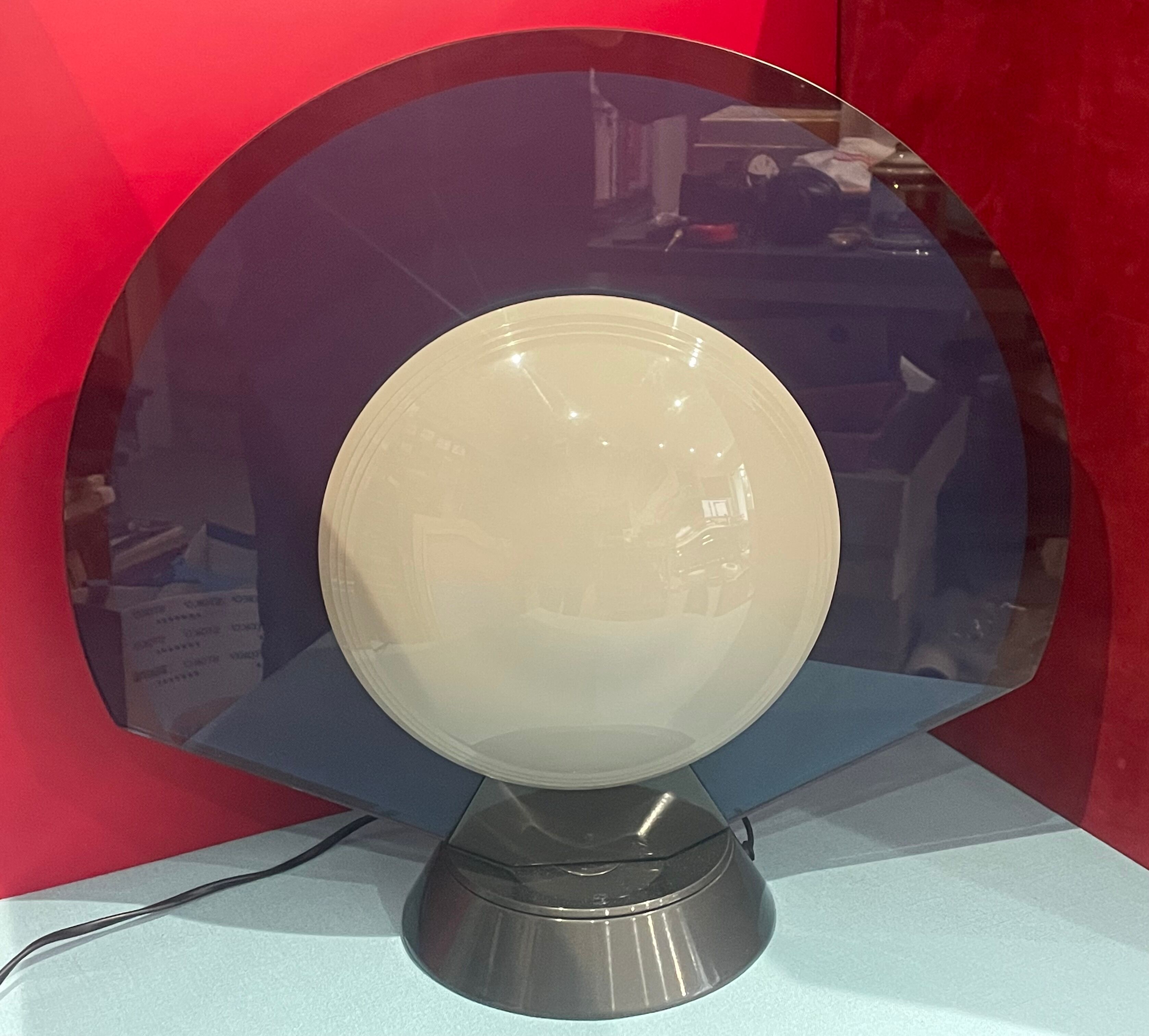 Rotating lamp Gong by Bruno Gecchelin, Arteluce Italy design