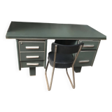 Old metal desk with chair