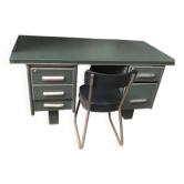 Old metal desk with chair