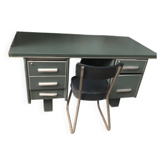 Old metal desk with chair