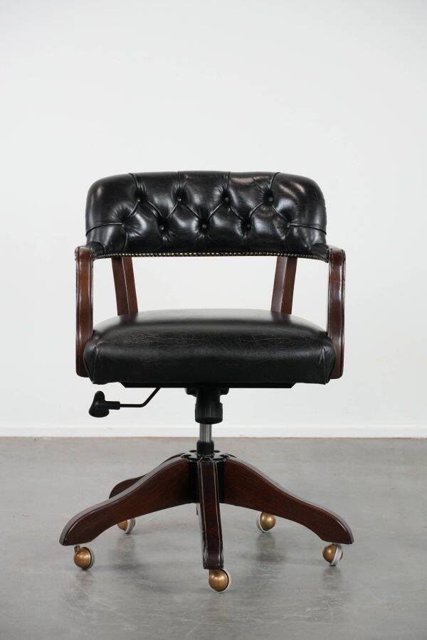 Adjustable black timeless Chesterfield office chair made of cow leather