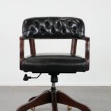 Adjustable black timeless Chesterfield office chair made of cow leather