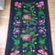 Handwoven summerish floral rug, black background with colorful delicate flowers 152x238cm