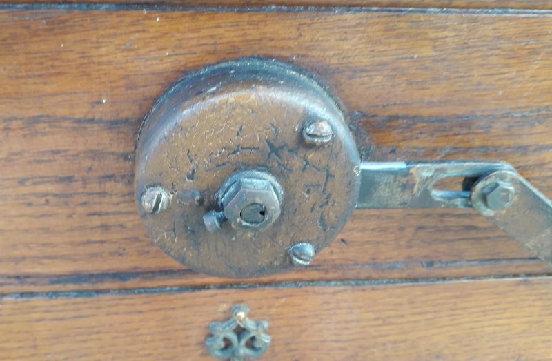 Oak entrance door and its frame and transom, wrought iron gates