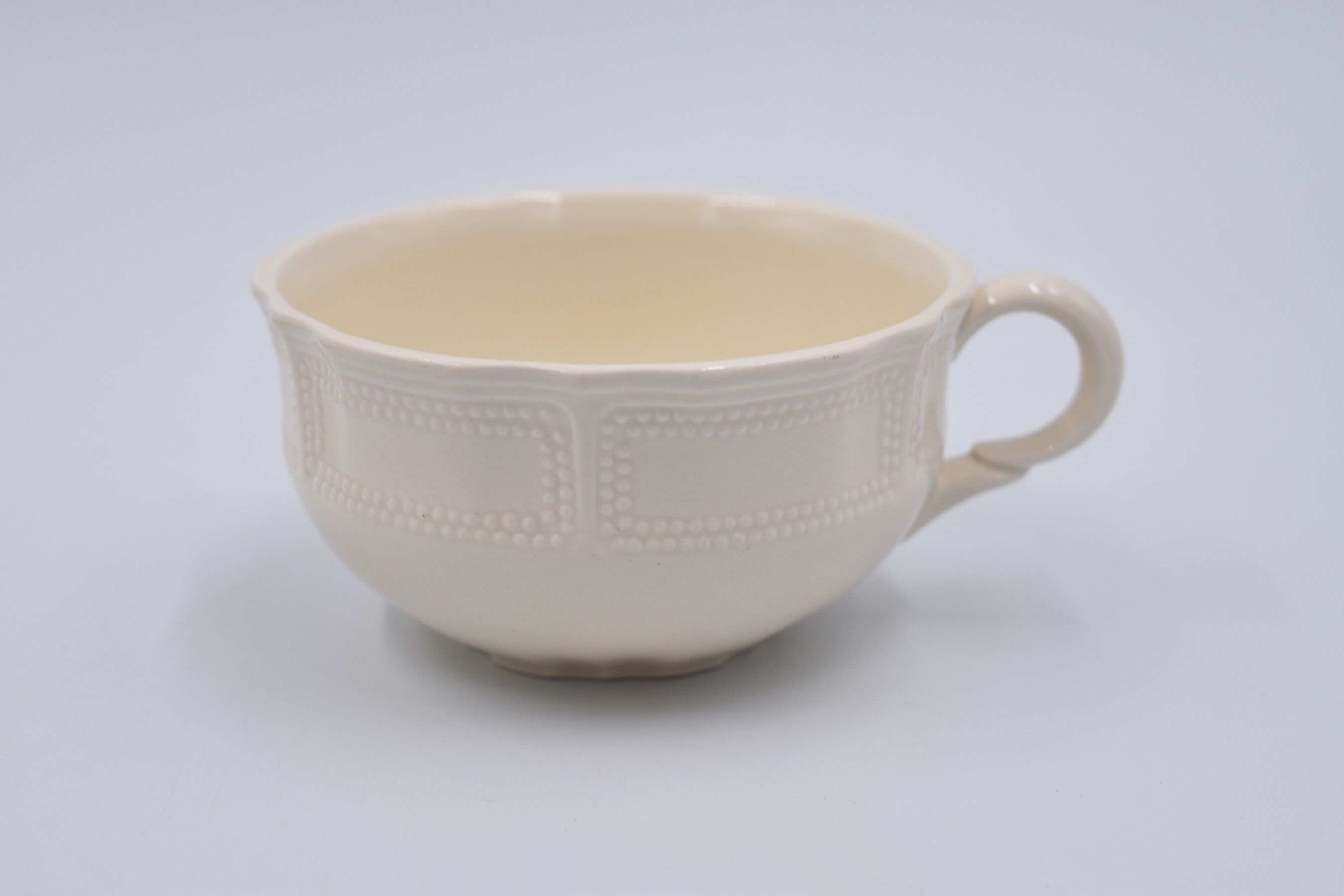 2 luncheon cups off-white earthenware Lunéville décor relief France